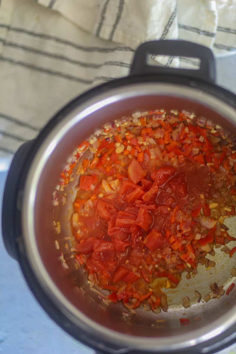 Add diced tomatoes.