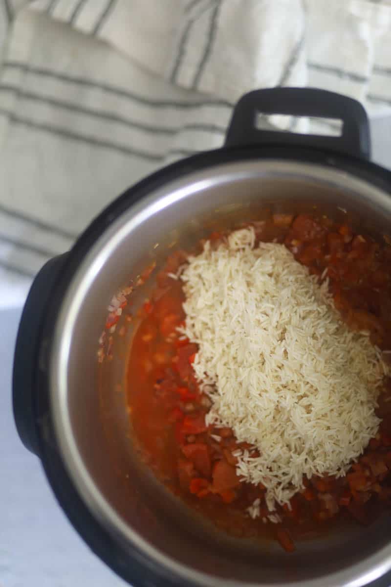 Then add rice and water.