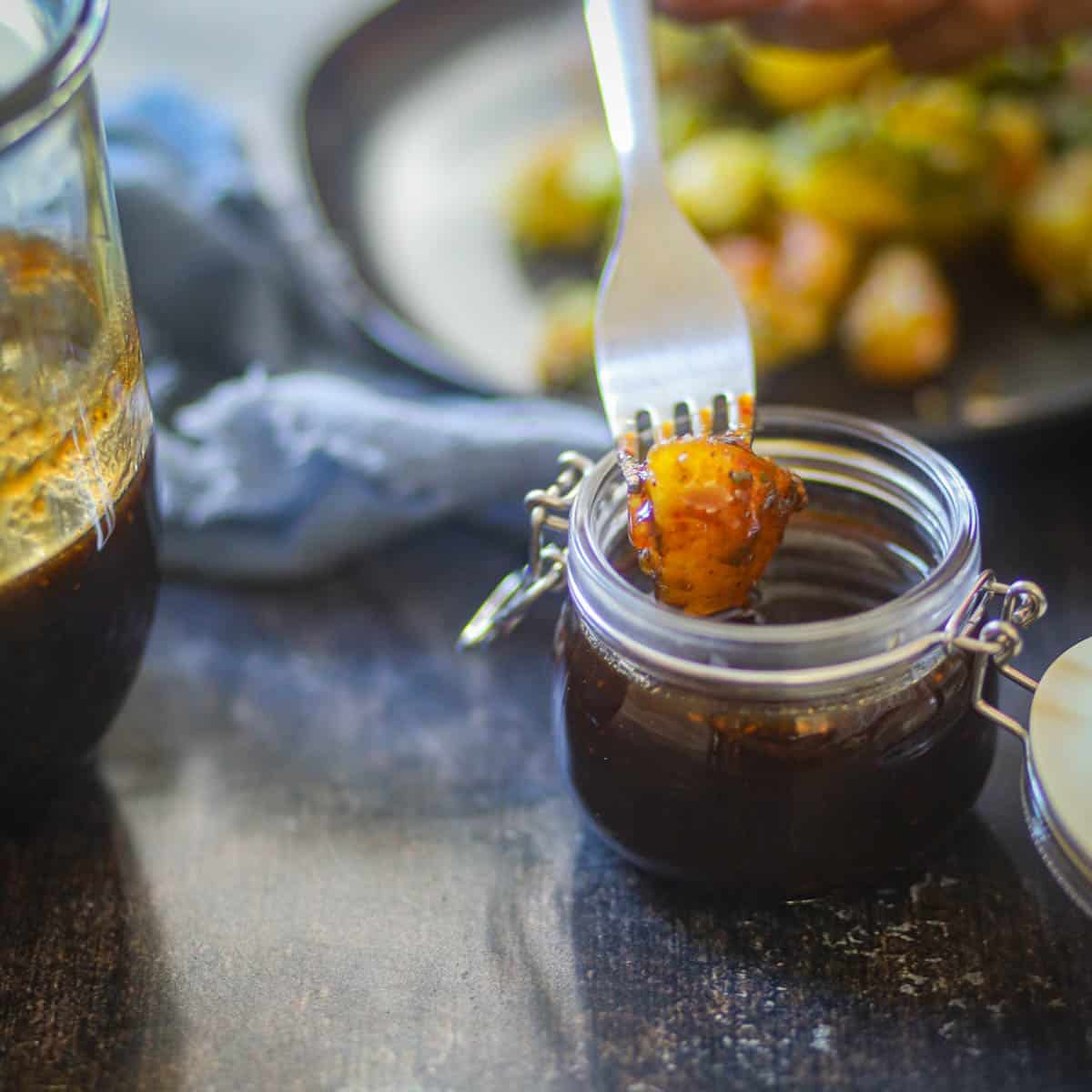 Dipping fried potatoes in tamarind chutney.