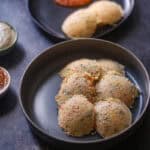 Rava Idli in a gray plate.