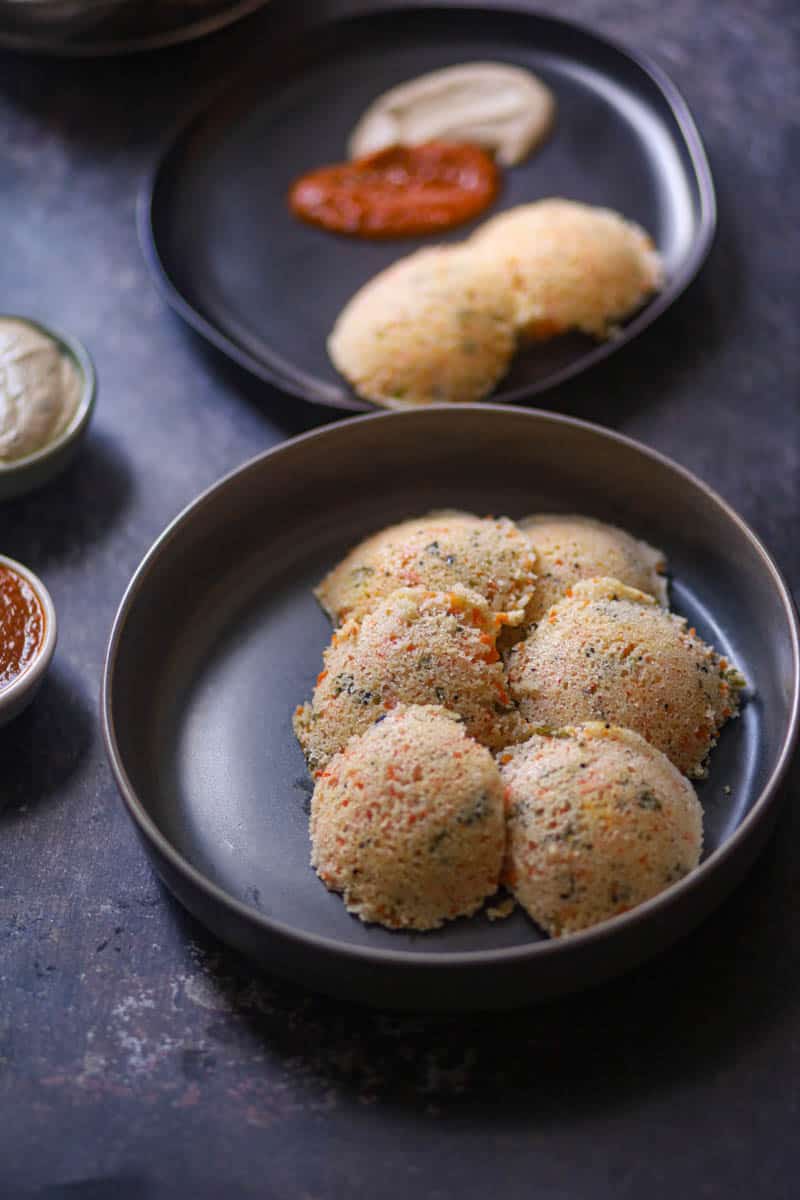 Rava Idli in a gray plate.