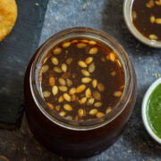 Homemade tamarind chutney with melon seeds.