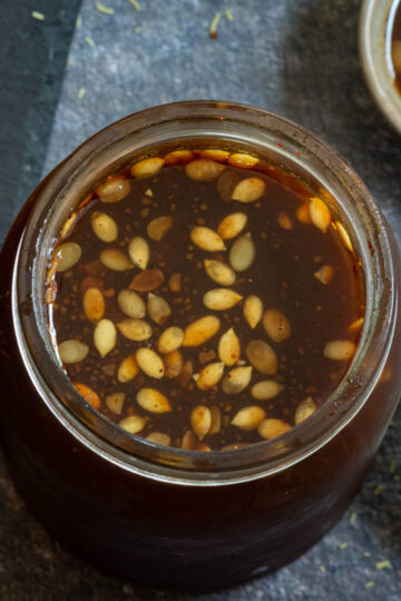 Homemade tamarind chutney with melon seeds.