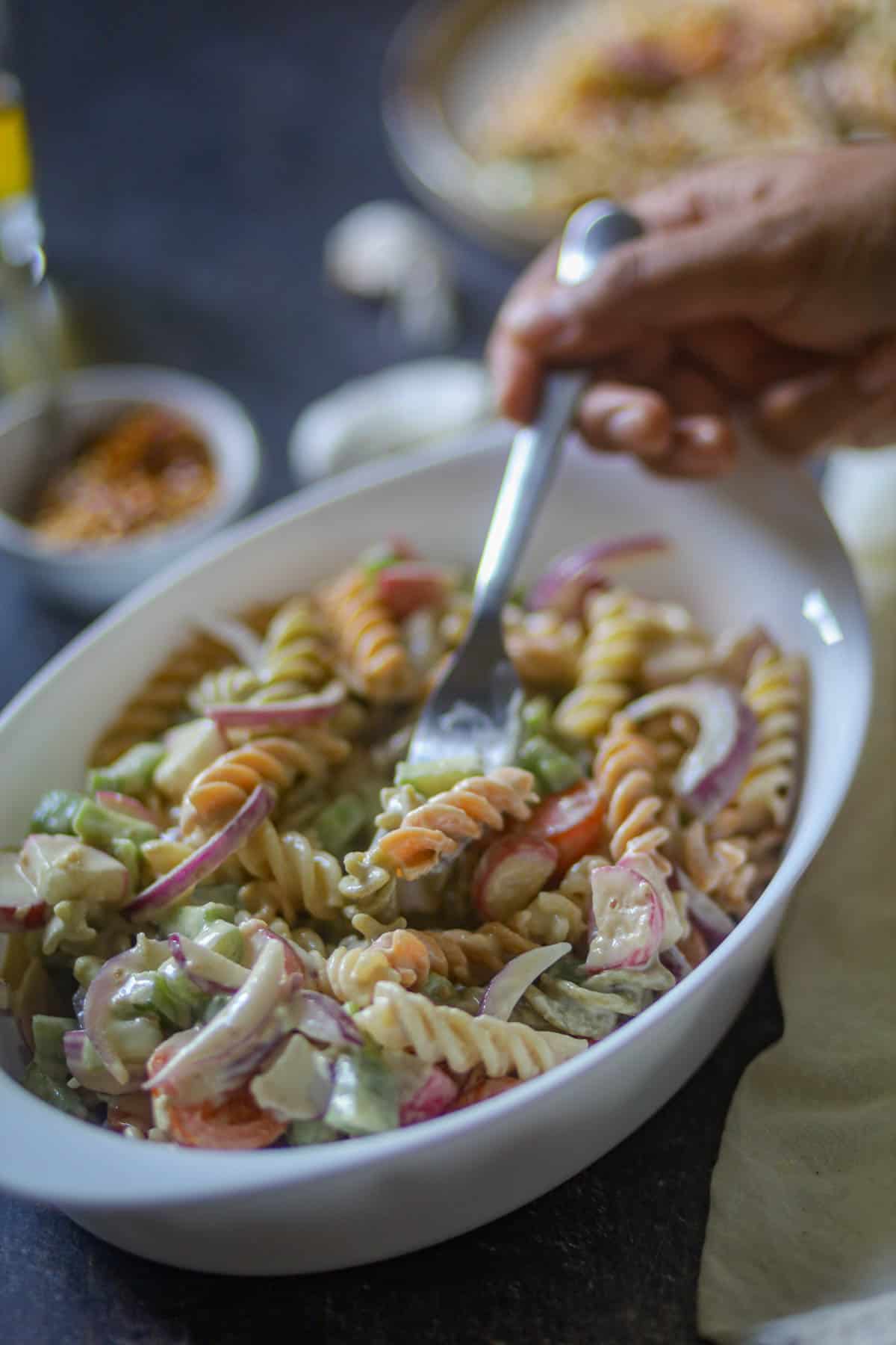 A spoonful of triolor pasta salad recipe.