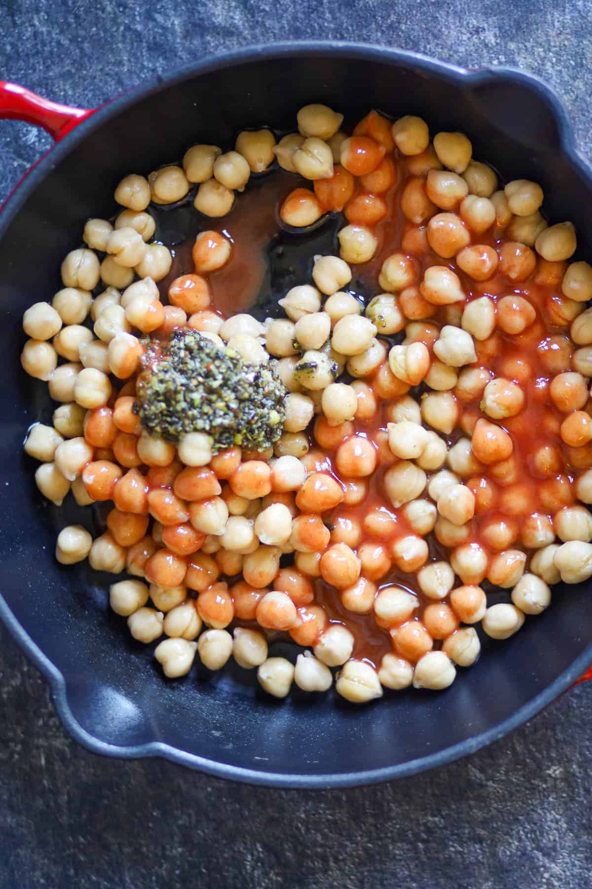 Add chikcpeas, hot sauce, and jalapeno crunch.