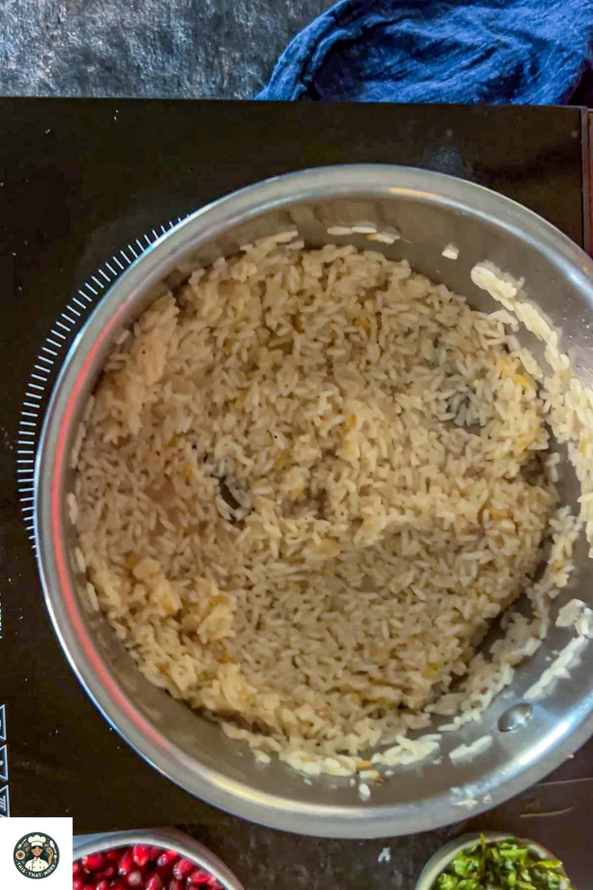 Image of cooked rice in the steel pot.