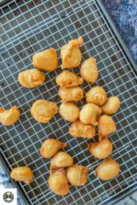 Remove the fritters until golden-brown in color.