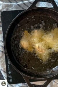 Add samosa in a hot oil, at low heat.