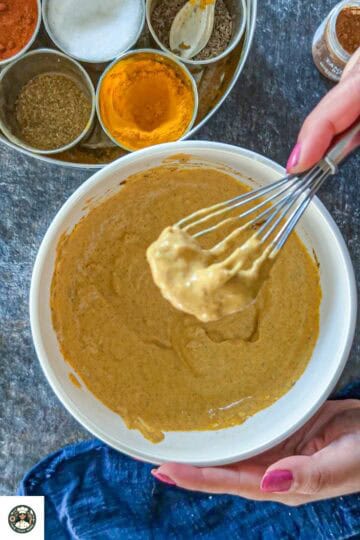 Image showing marination is ready after whisking the ingredients.