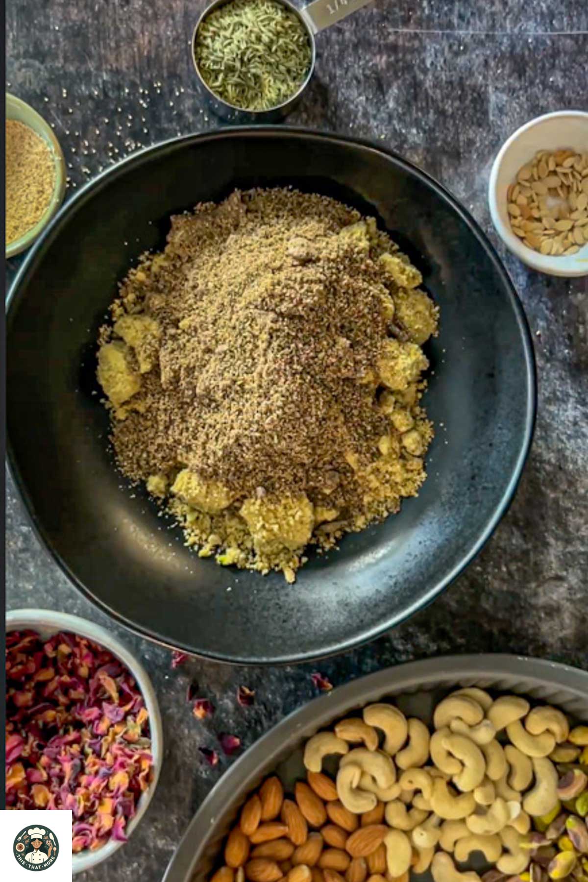 Blended nut powder nad spice powder added on the black bowl