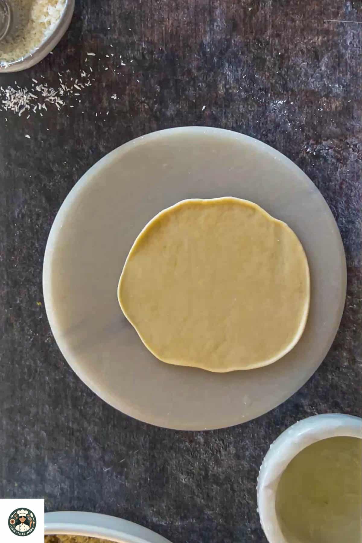 Image showing rolled dough until flat.