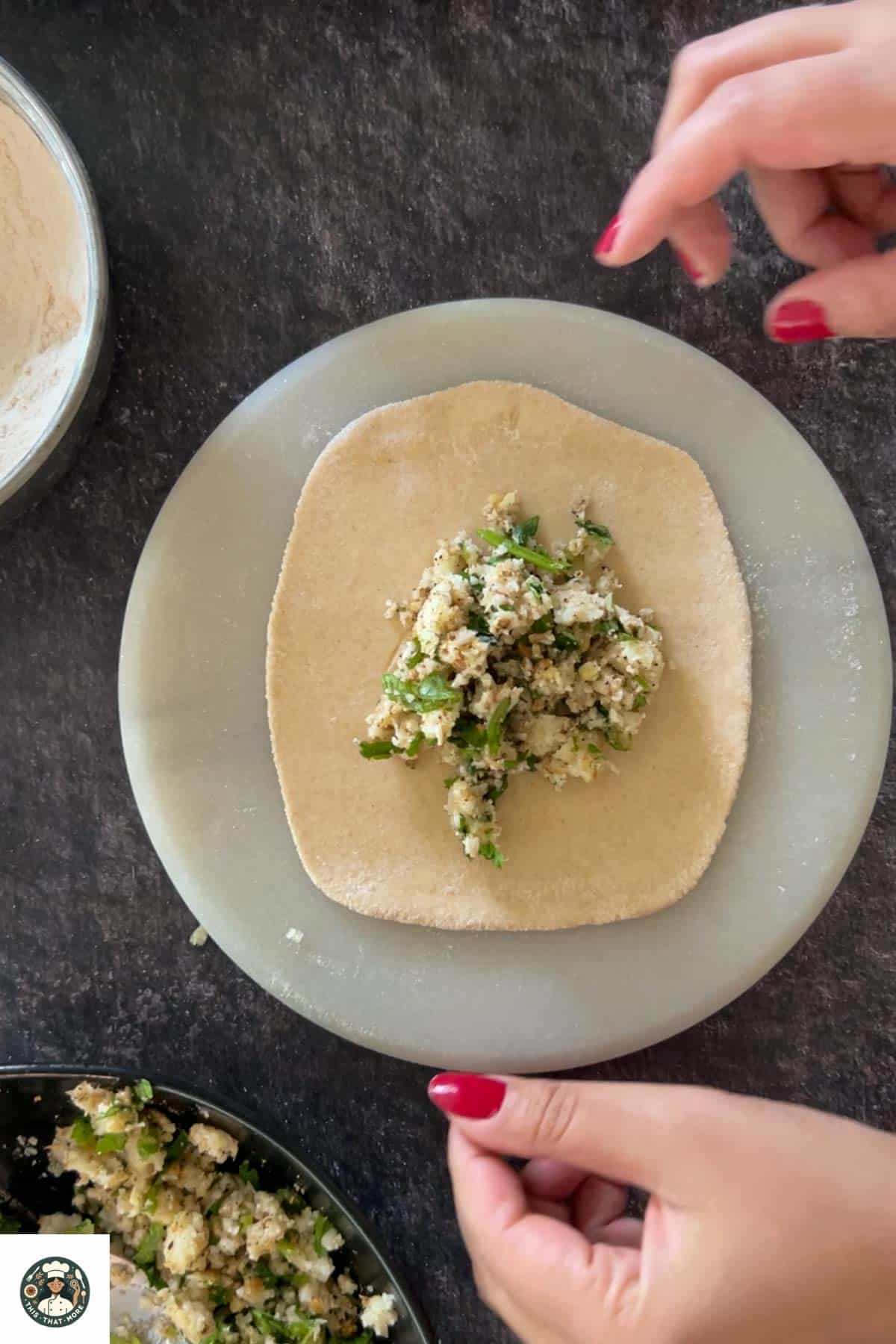 Roll the dough using a rolling pin until ½ inch in thickness. Add the filling in the middle of the dough.