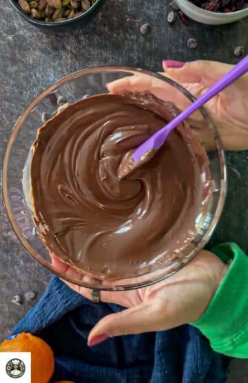 Melted dark chocolate stirred until smooth for chocolate bark.