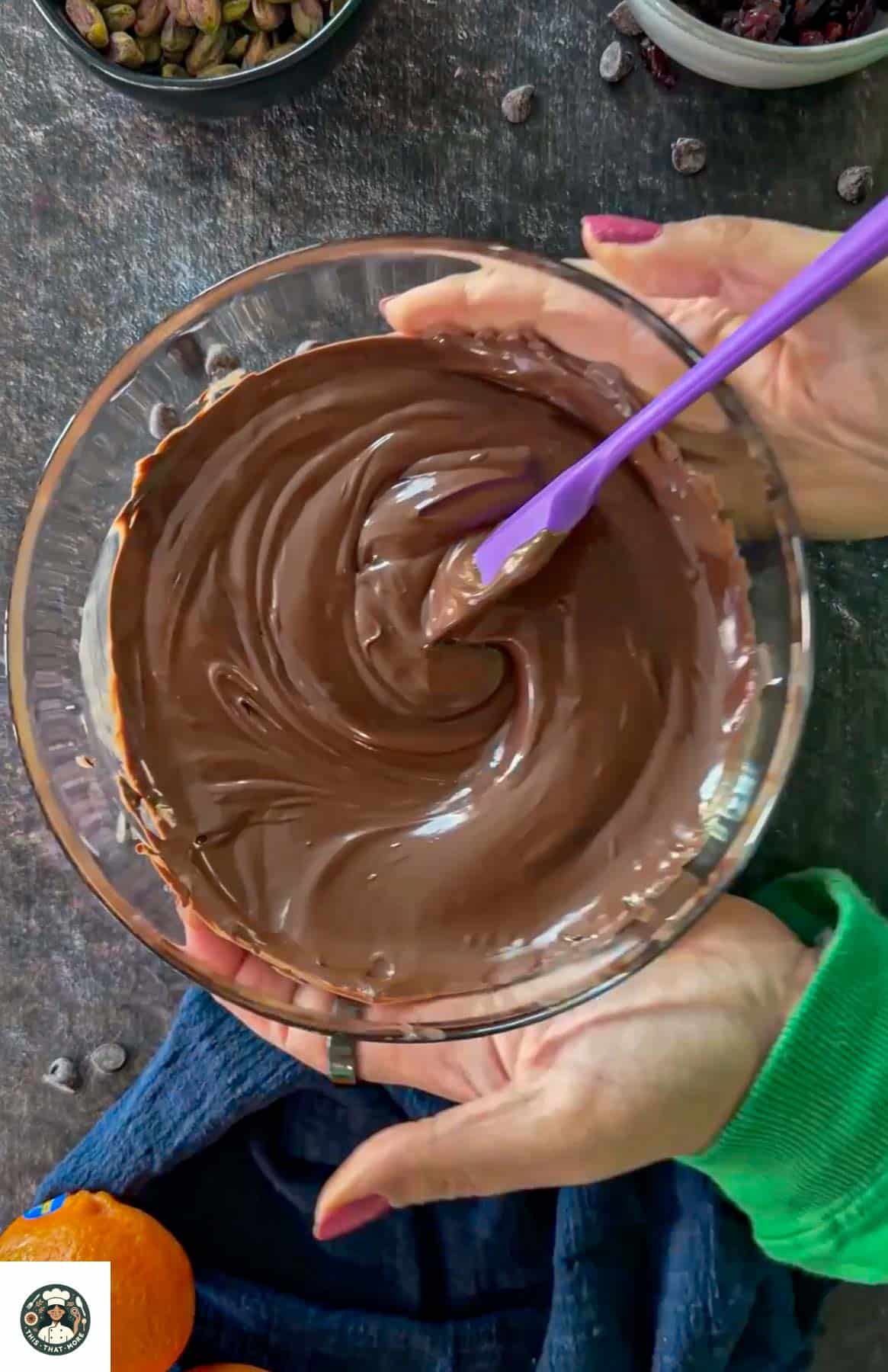 Melted dark chocolate stirred until smooth for chocolate bark.