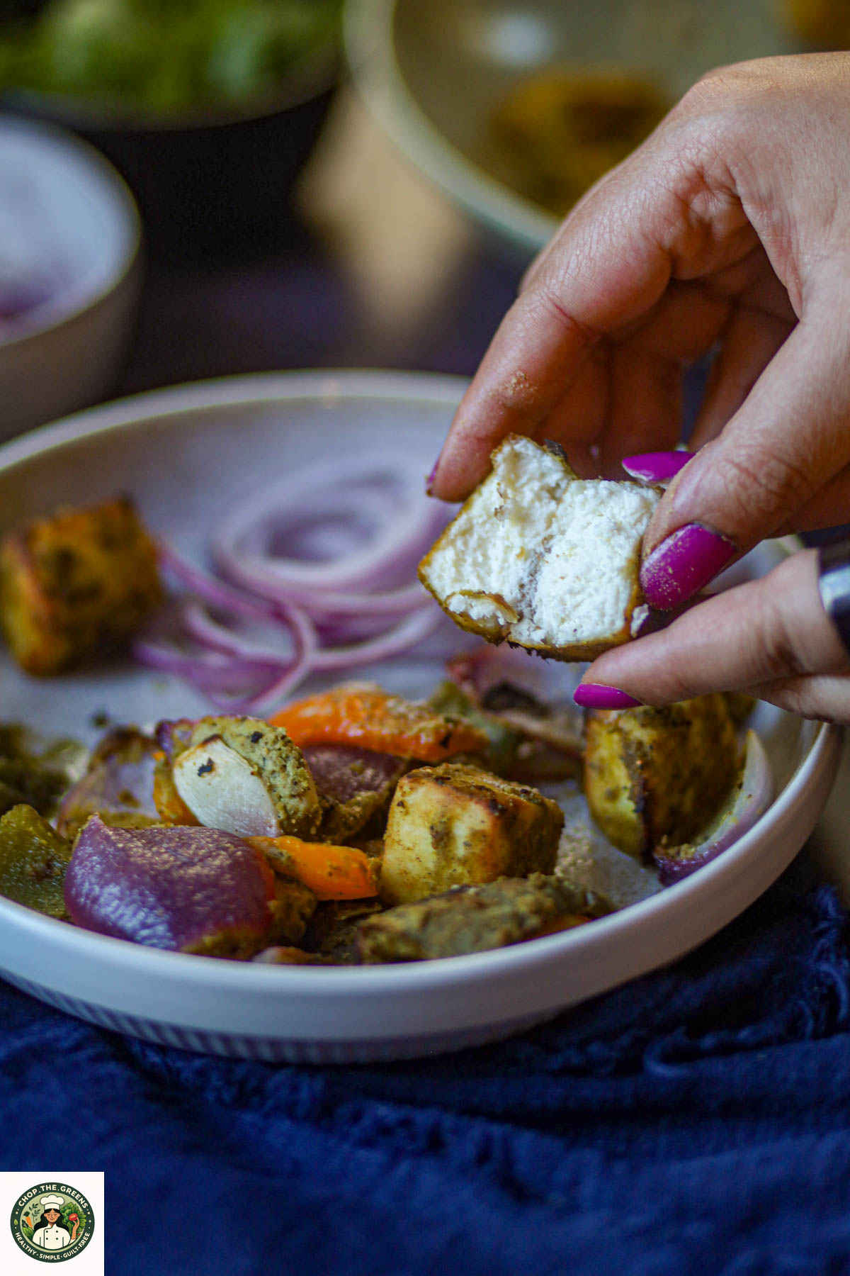 Inside texture of hariyali paneer tikka showing soft paneer.