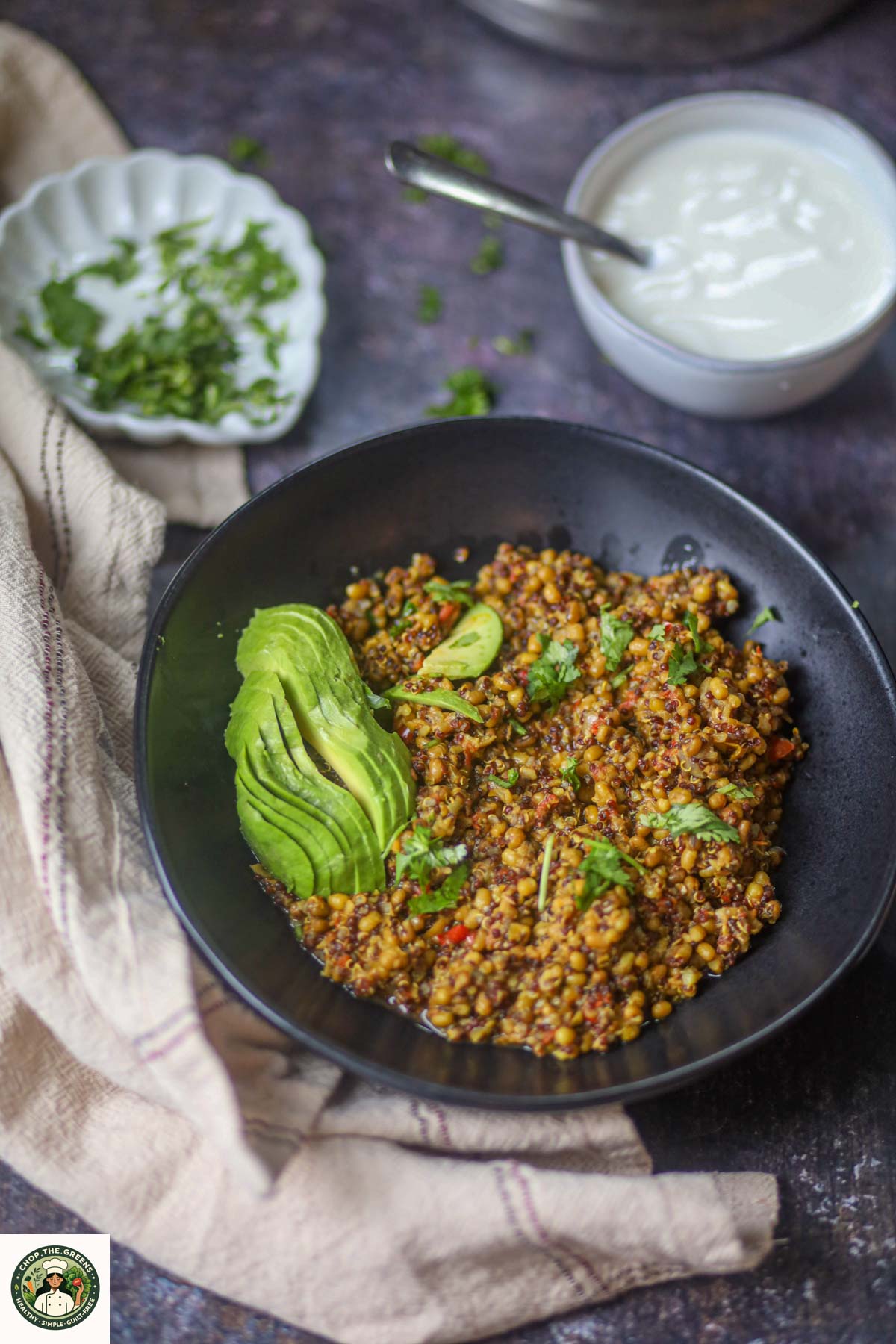 Instant Pot lentil and quinoa protein bowl served with avocado and herbs.
