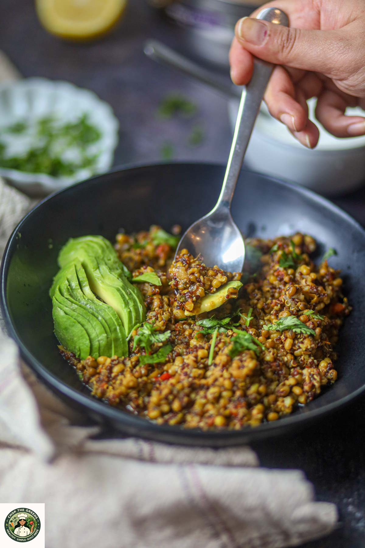 Spoonful of Instant Pot lentil and quinoa protein bowl.