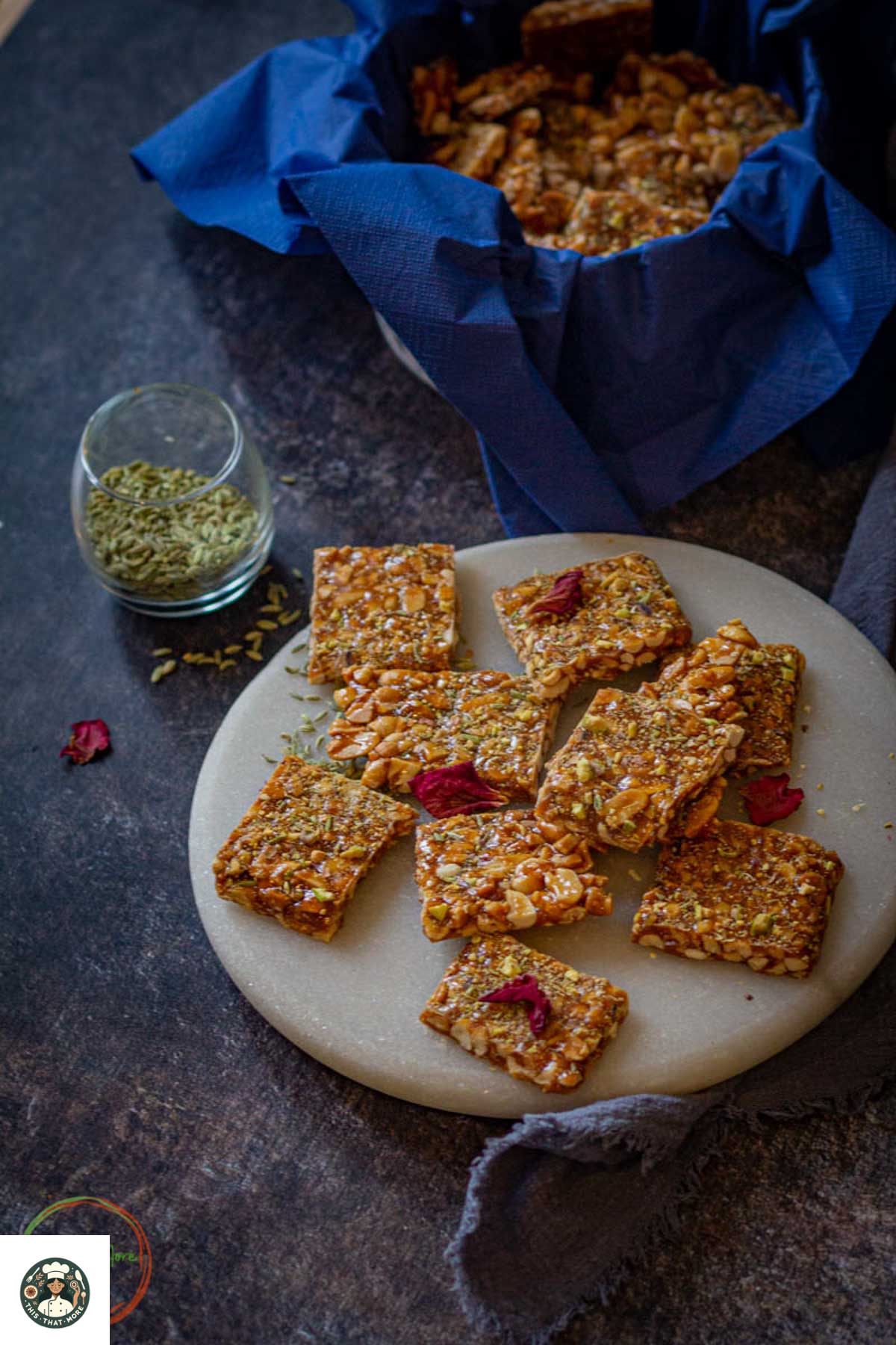 Homemade peanut chikki arranged on a platter.