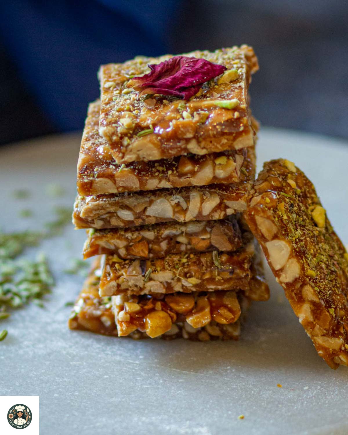 Peanut chikki made with jaggery, traditional Indian peanut brittle cut into squares.