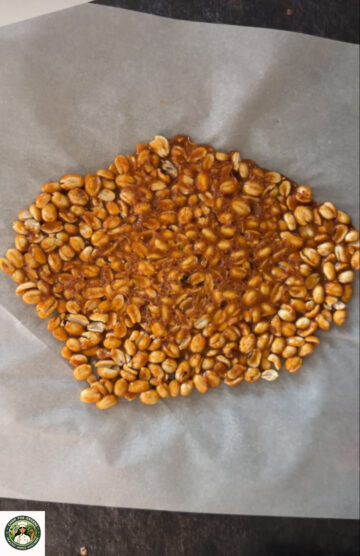 Garnished gajak slab ready to cut.