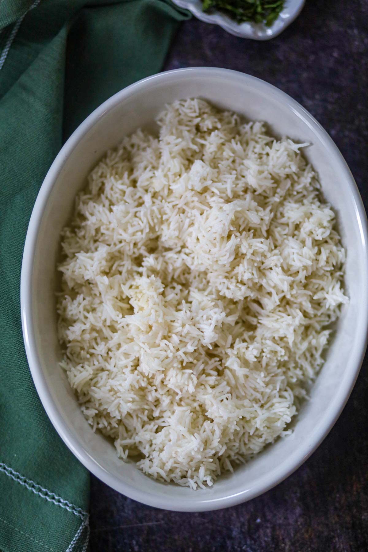 Top view of fluffy basmati rice in a serving bowl.