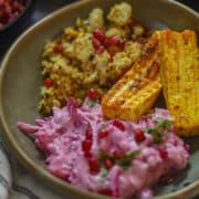 High protein paneer tikka bowl with beetroot raita and quinoa base.