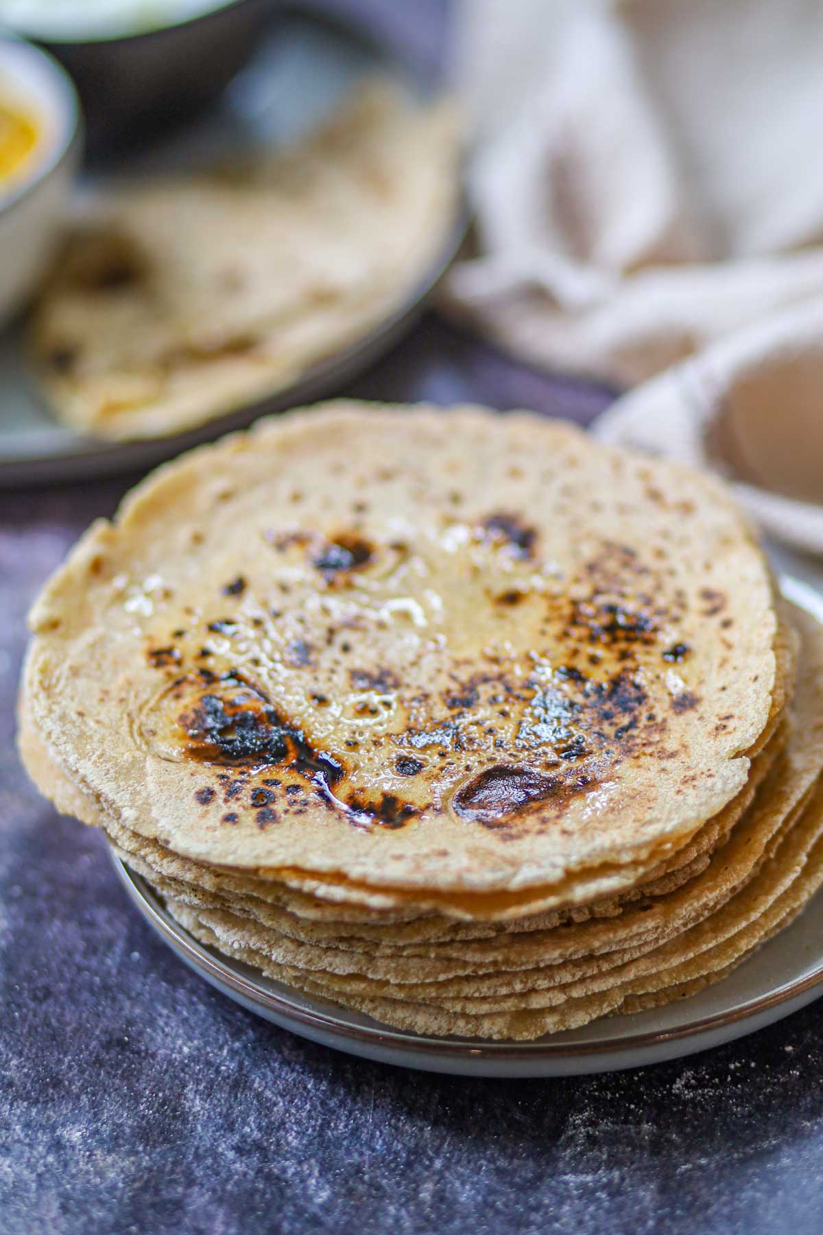 Stack of soft high protein tofu rotis on a plate.