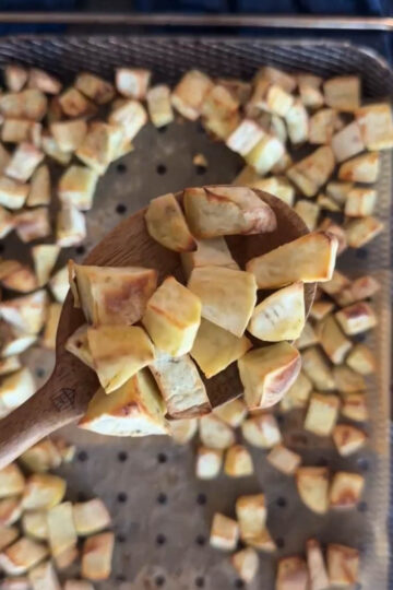 Air-fried sweet potato cubes with lightly browned edges.