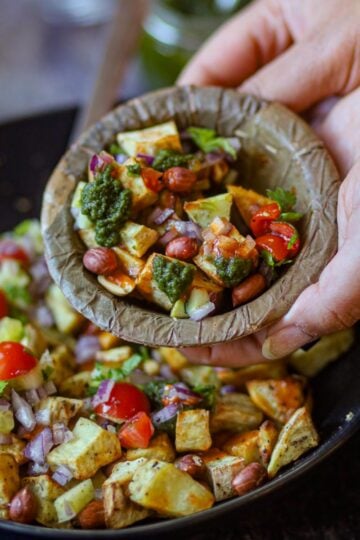Air fryer sweet potato chaat served with chutneys and peanuts.